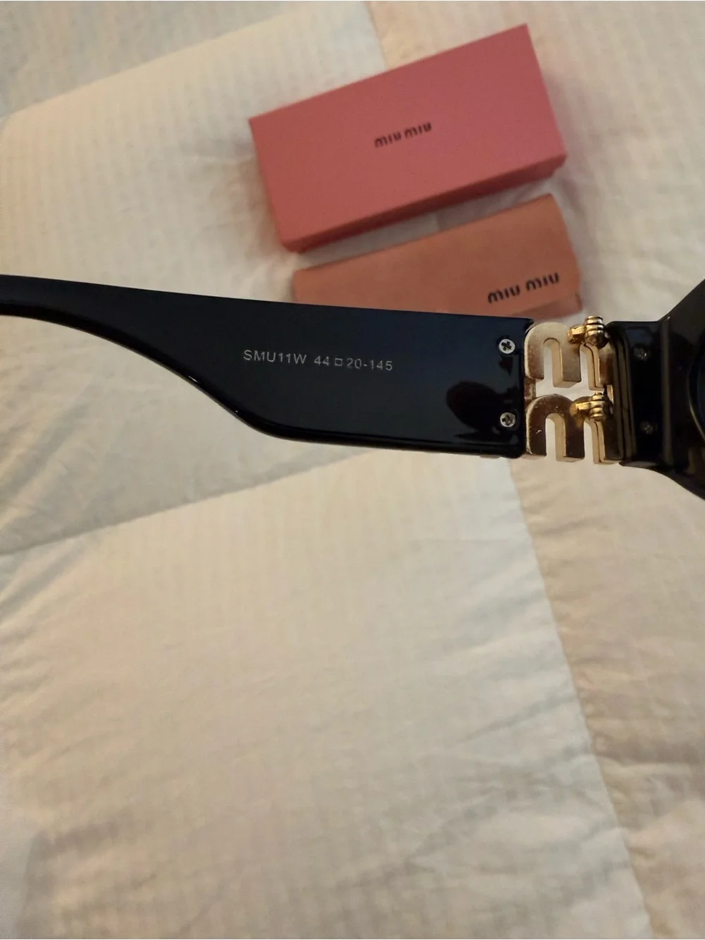 Miu Miu Black Oval Sunglasses with Pink Branded Case and Box